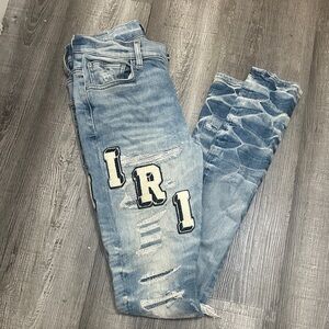 AMIRI Light Blue Distressed Skinny Jeans